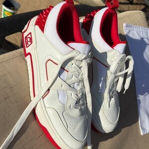Christian Louboutin Astroloubi low-top sneaker in white and Loubi red calf lthr